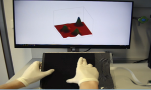 A Large-Scale Fabric-Based Tactile Sensor Using Electrical Resistance Tomography