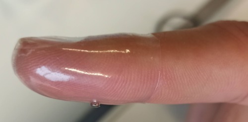 Generating Clear Vibrotactile Cues with a Magnet Embedded in a Soft Finger Sheath